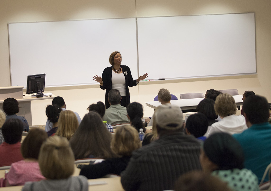 An instructor addresses students during a College of DuPage orientation classroom session.